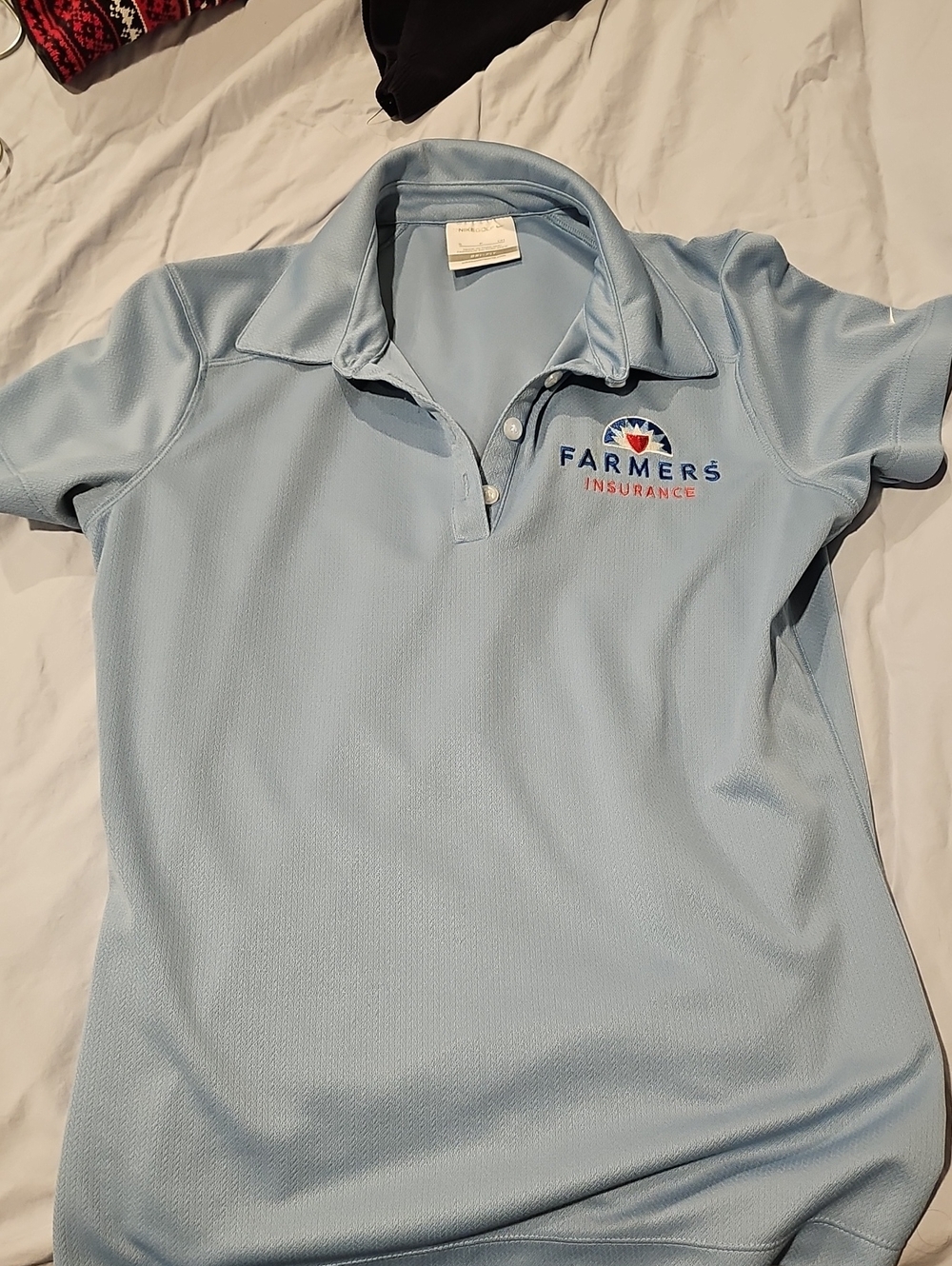 Nike Farmers Insurance Light Blue Dri-FIT Golf Polo
